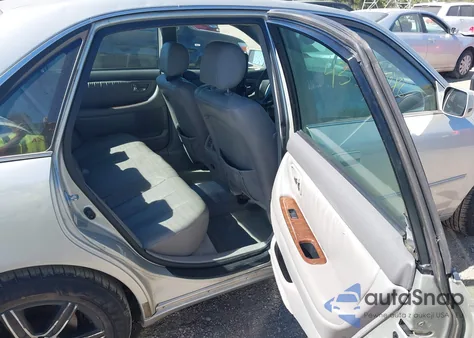 2001 Toyota Avalon Xls from USA, damaged, VIN 4T1BF28B41U125954